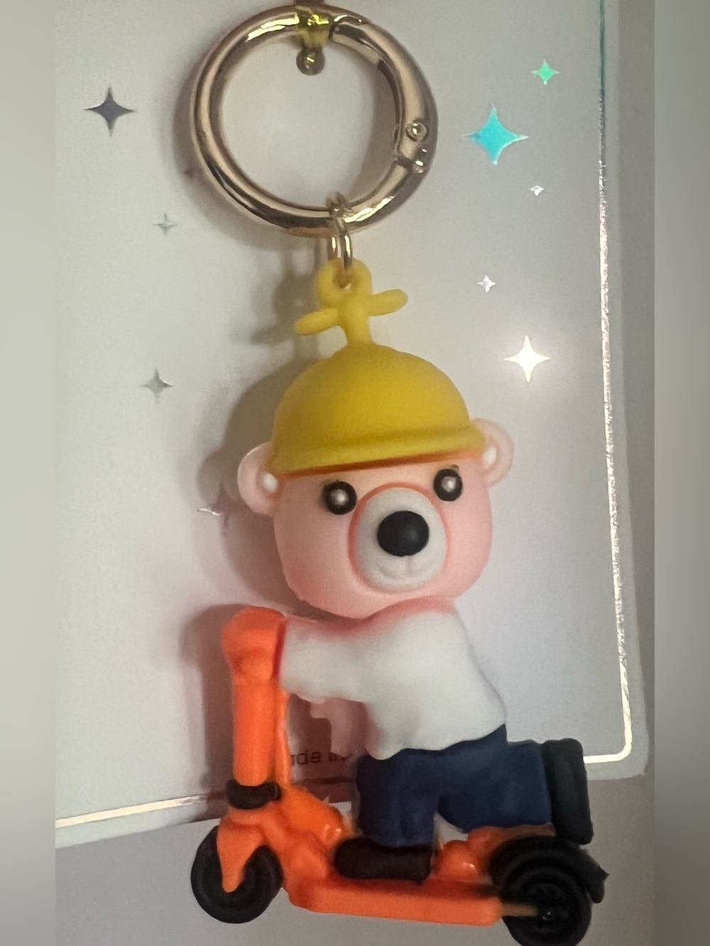 Cute Pink Bear on Orange Scooter Silicone Keychain with Yellow Helmet